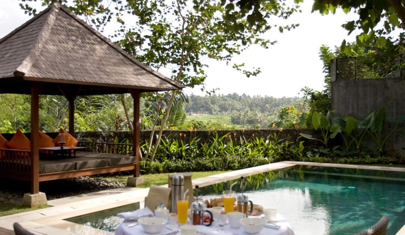 IN VILLA DINING BY THE POOL